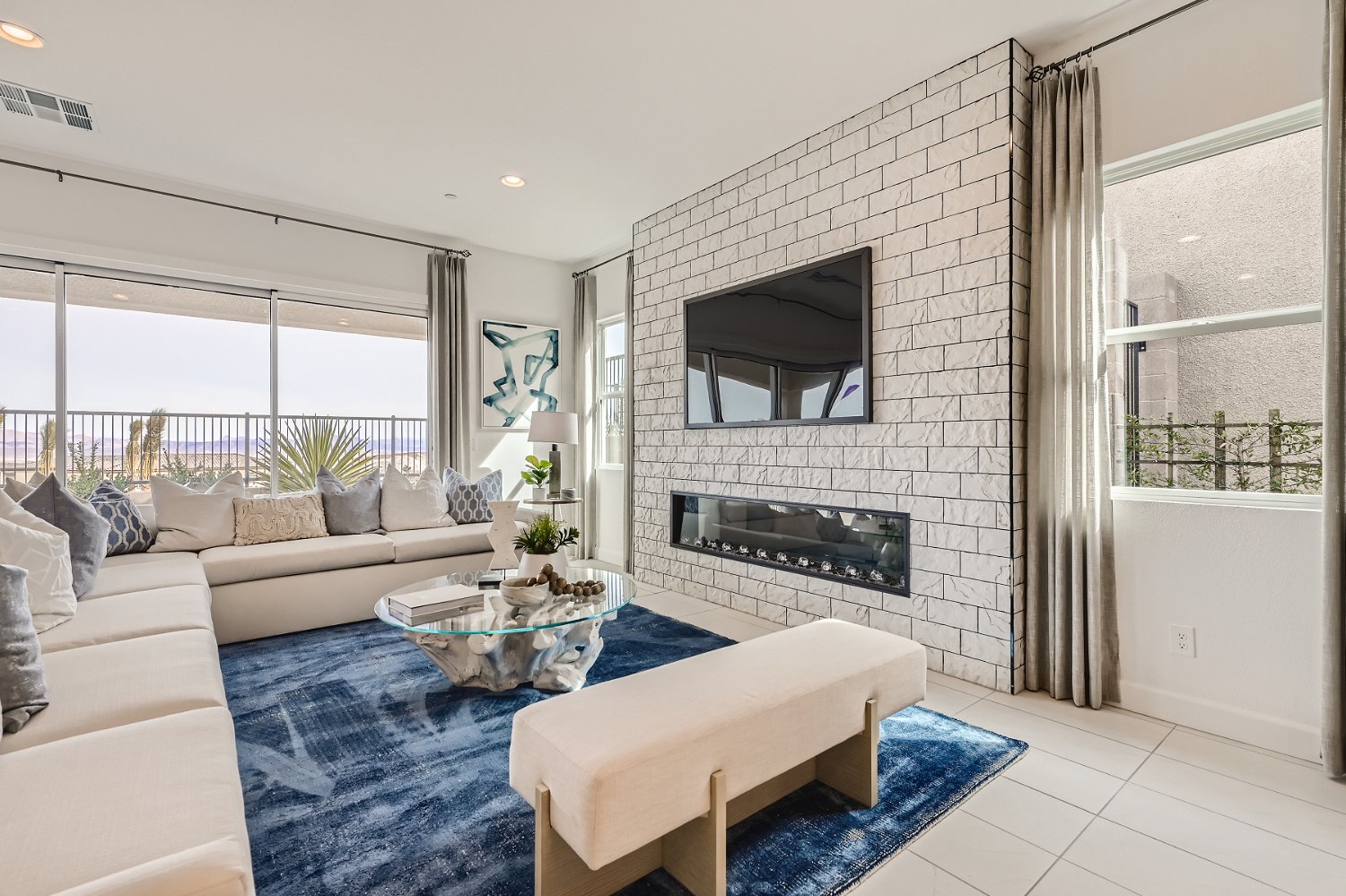 A living room with a fireplace.