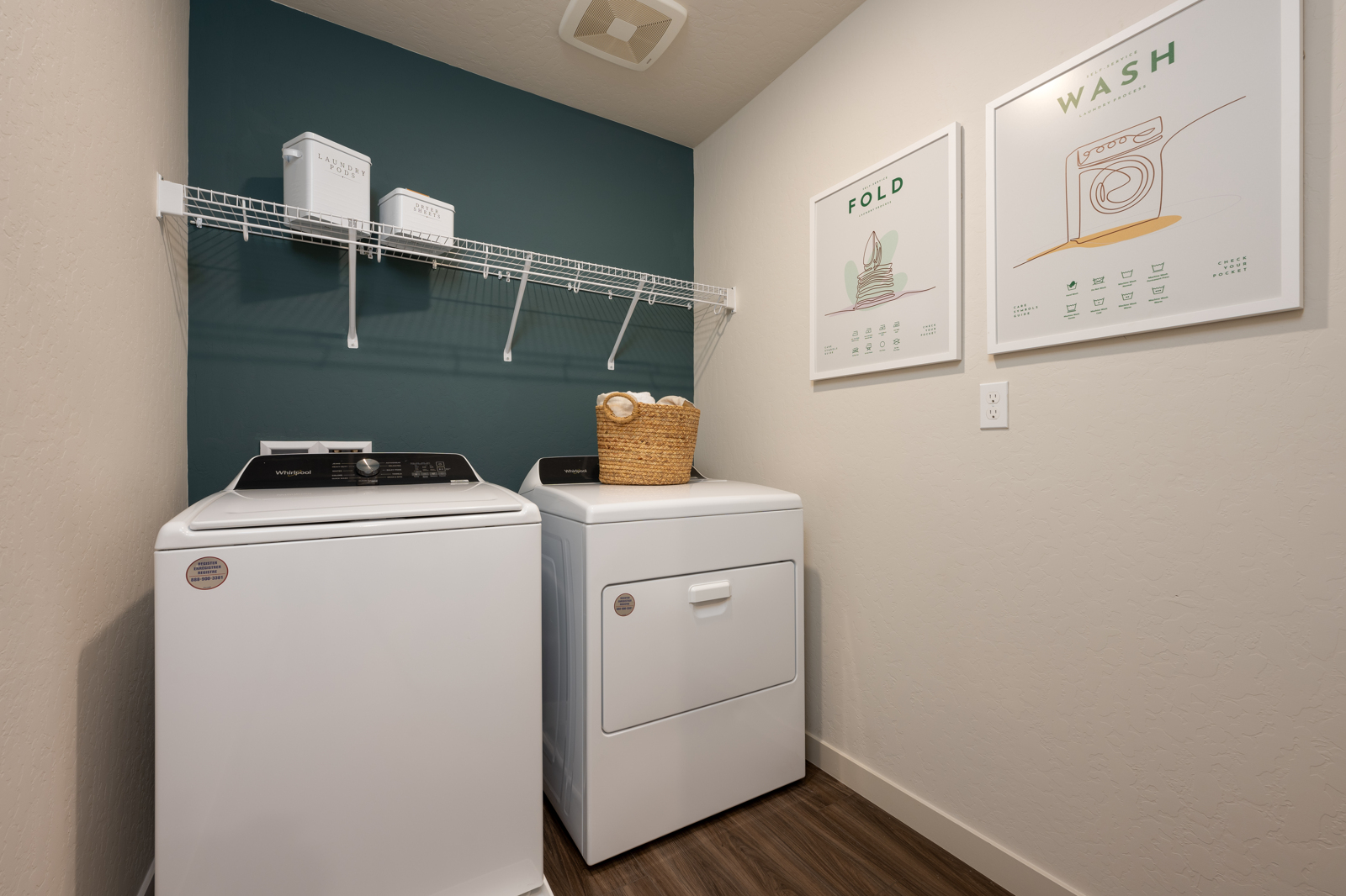 A laundry room with a washer and dryer.