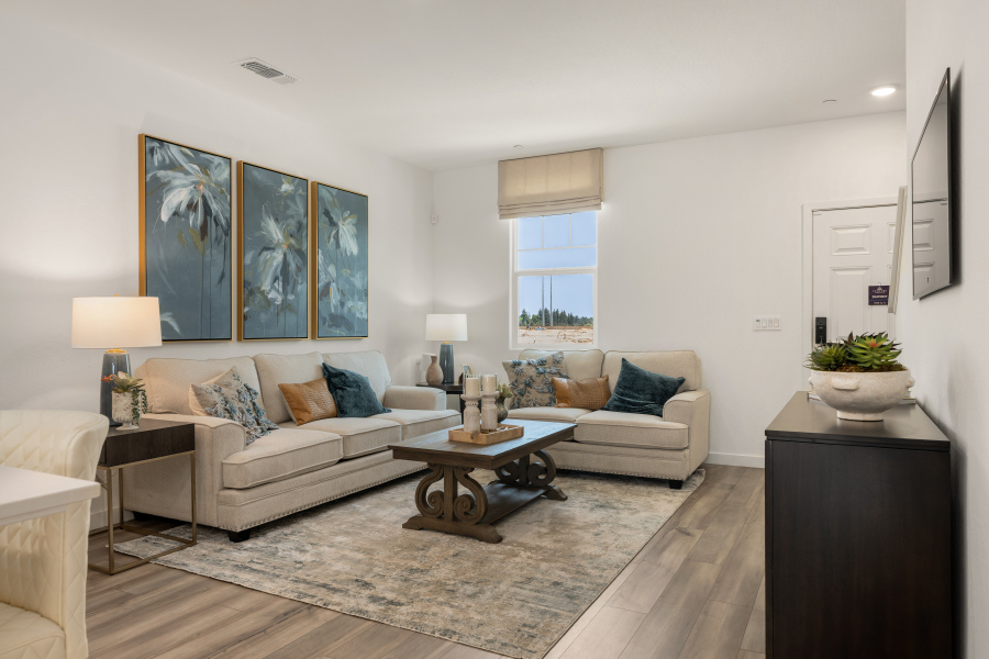 A living room with a couch and a coffee table.
