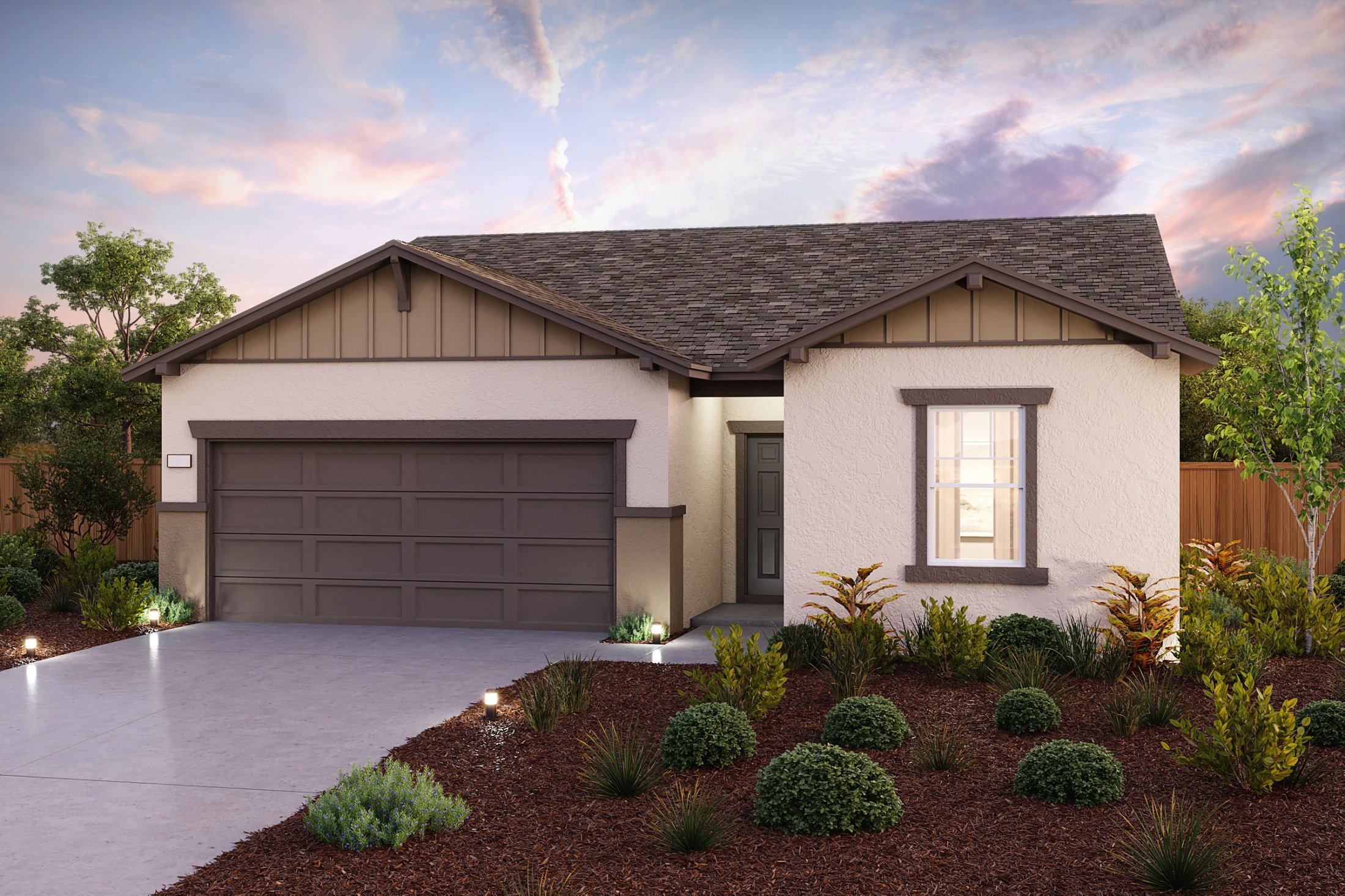 A house with a garage and a driveway.