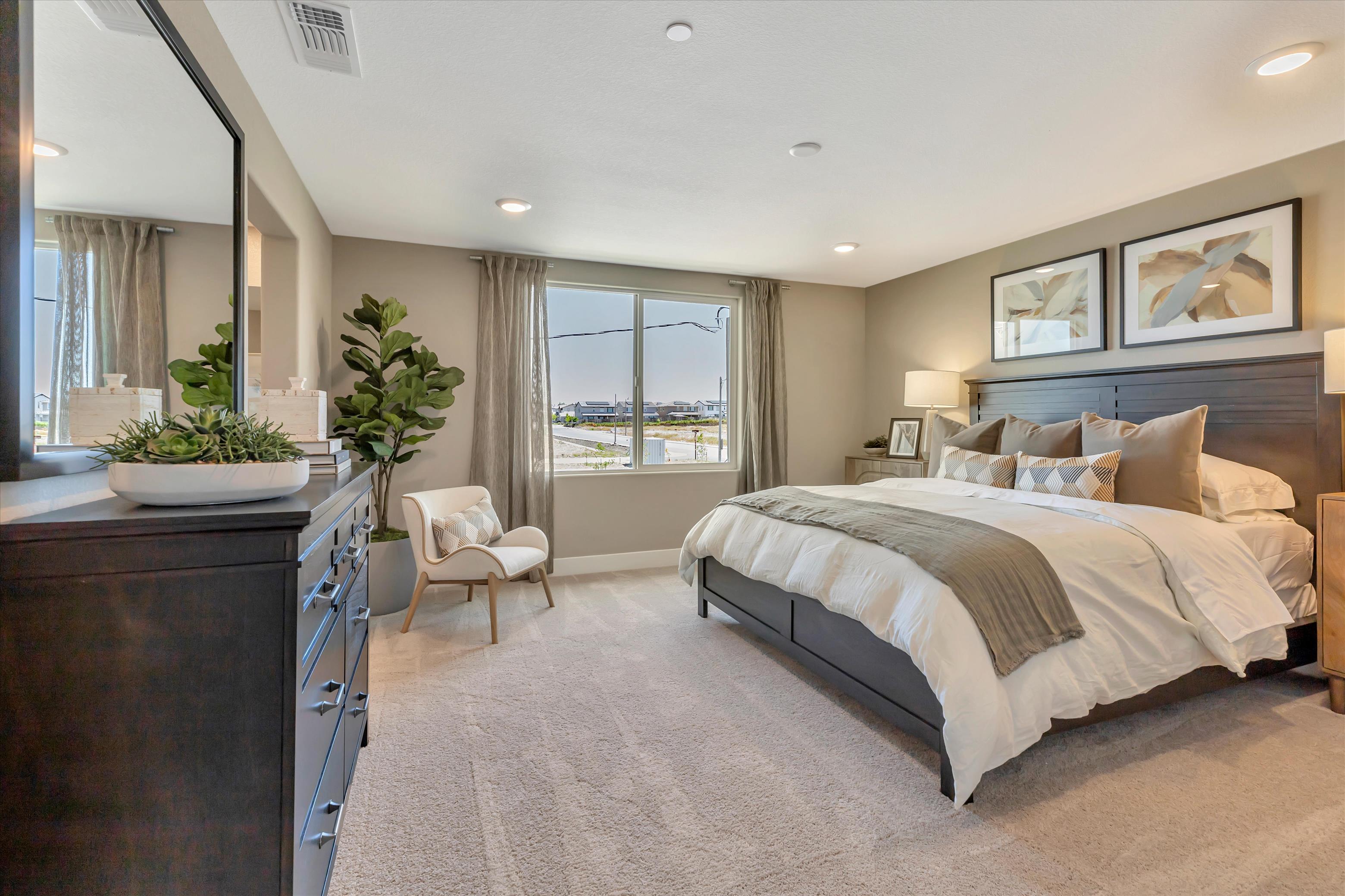 A bedroom with a large bed.