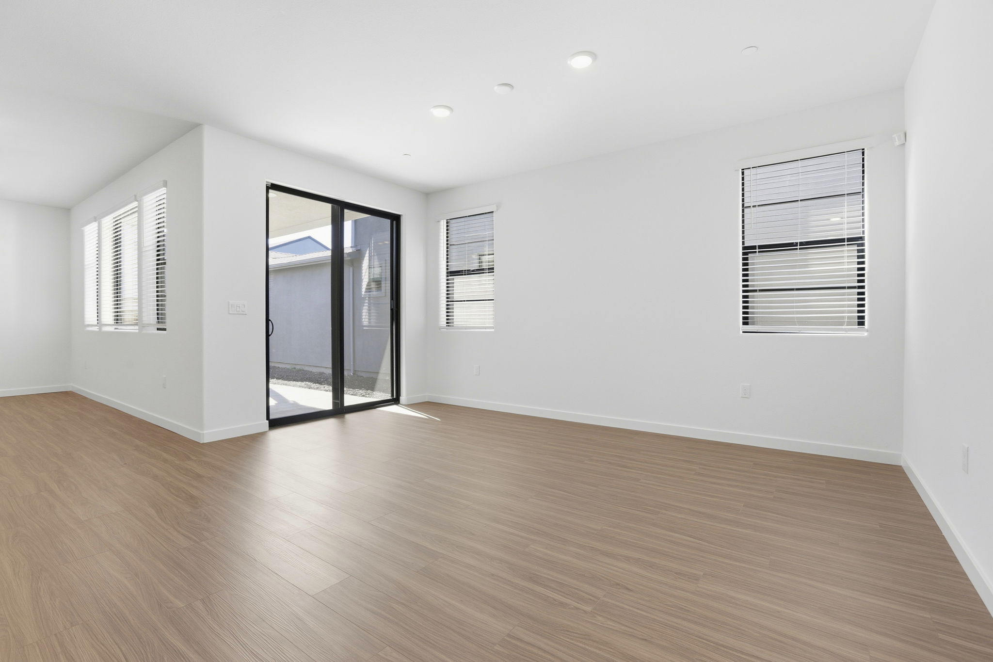 A room with a wood floor and a wood floor.