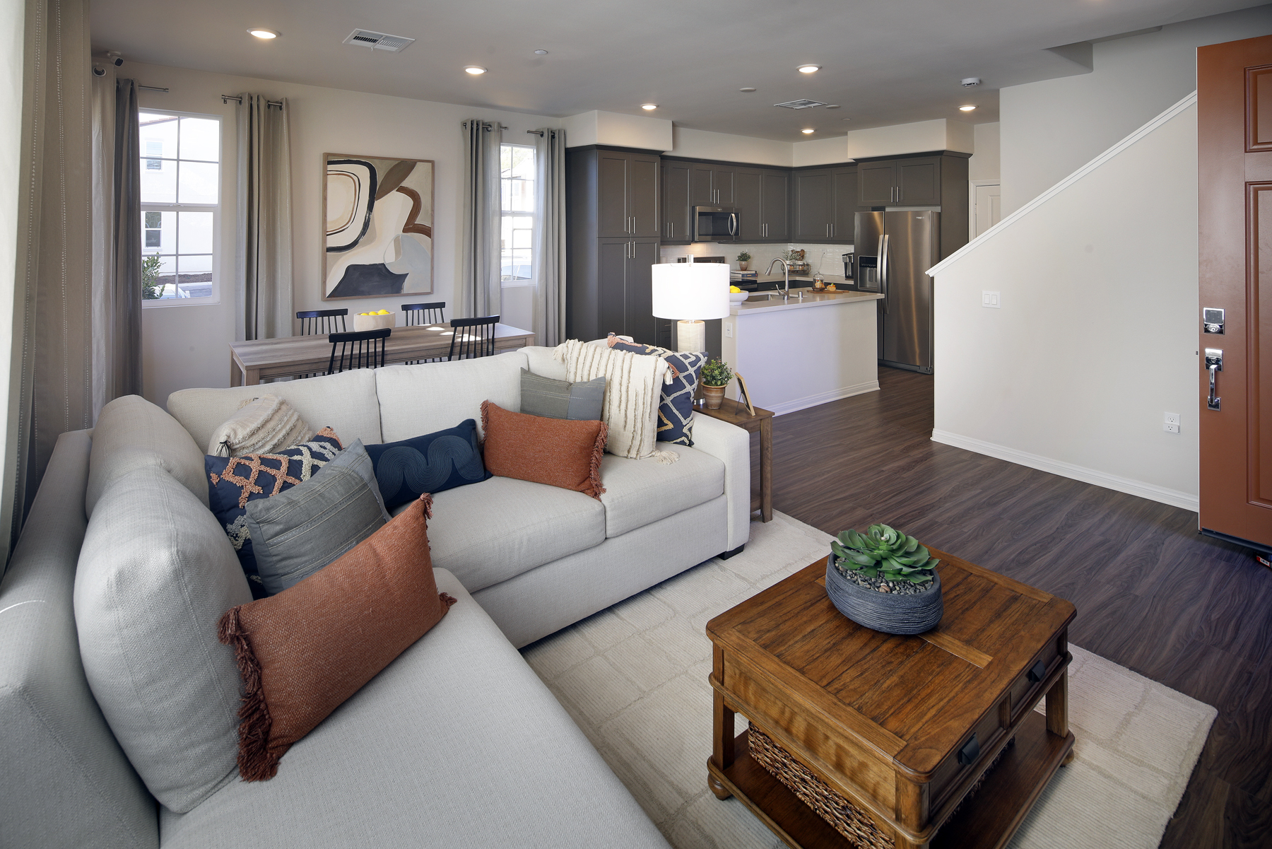 A living room with a couch and coffee table.
