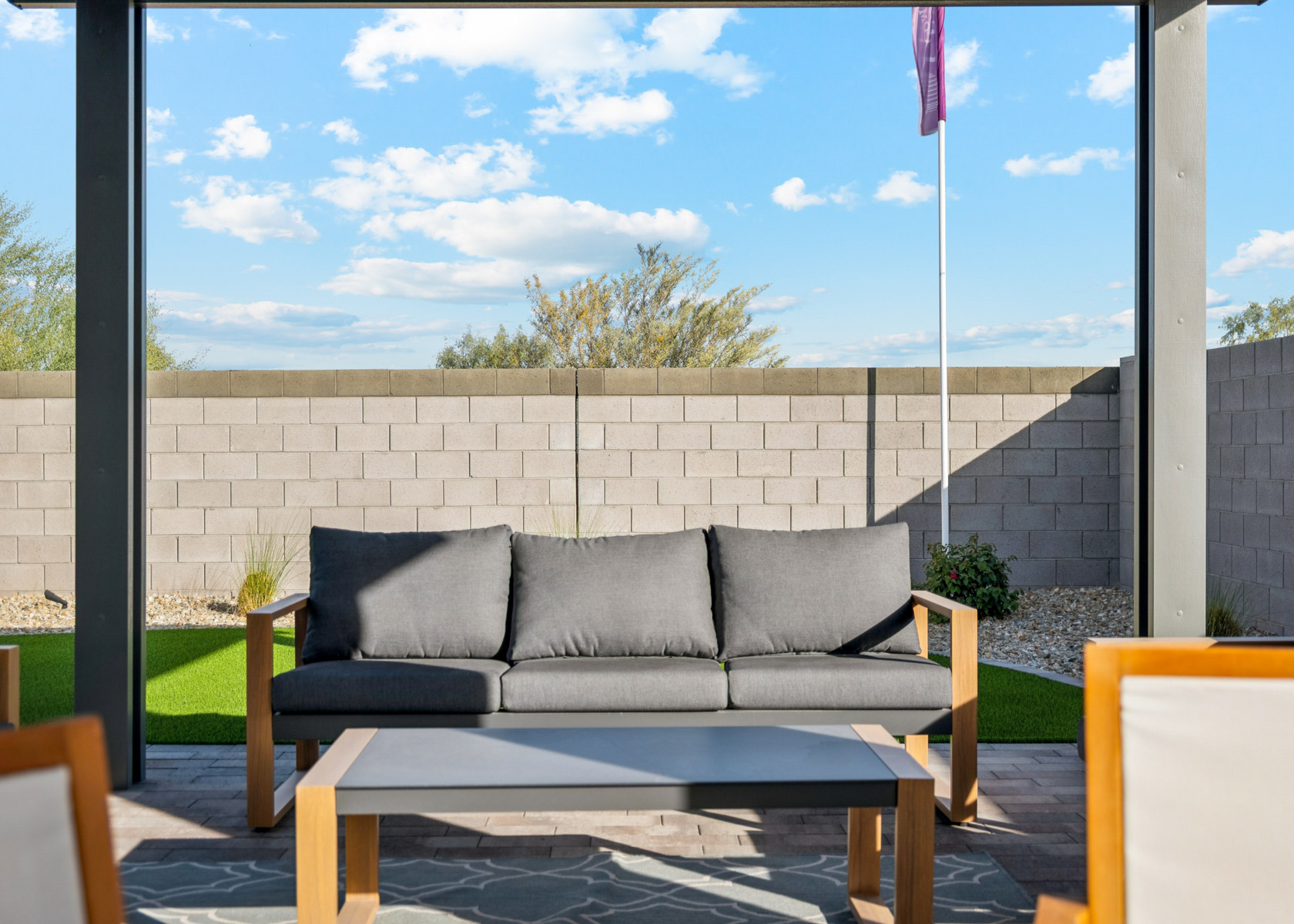 A couch and a table outside.