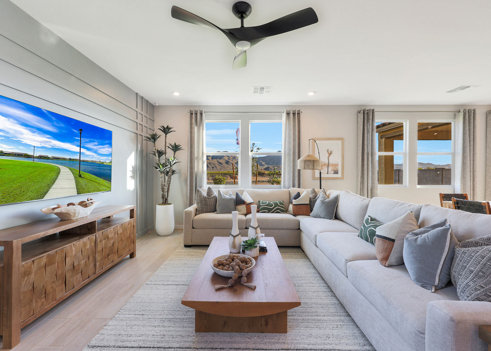 A living room with a large window.
