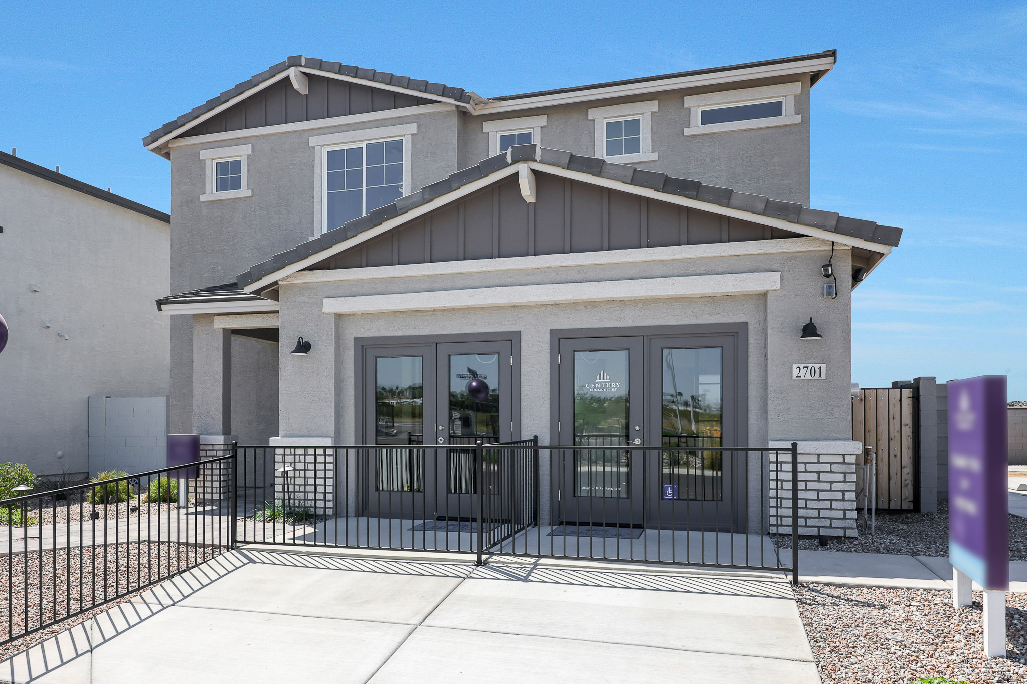 A house with a black fence.