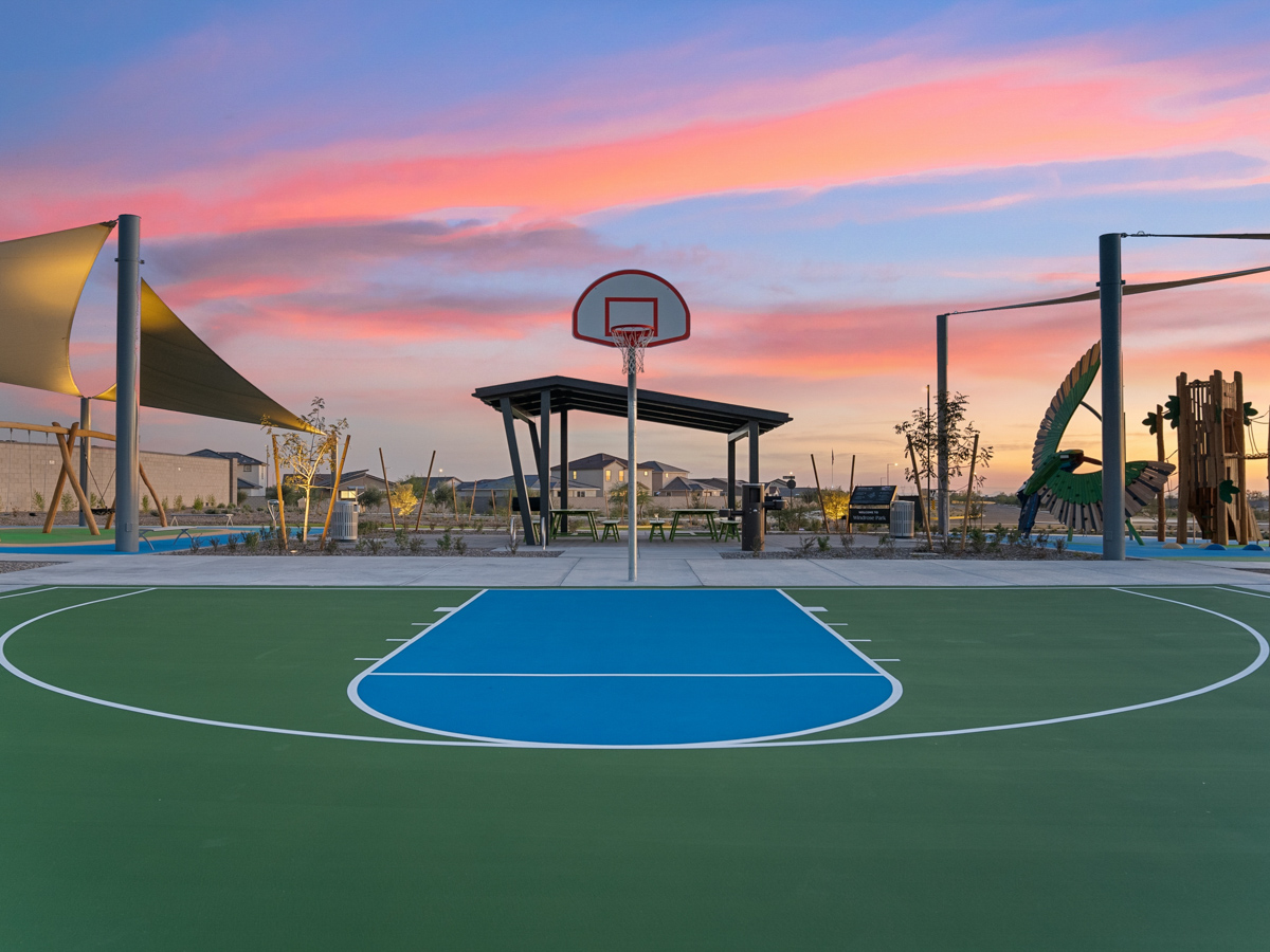 A basketball court with a basketball hoop.