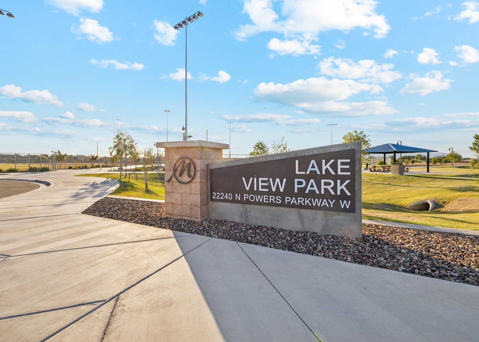 A sign on a concrete surface.