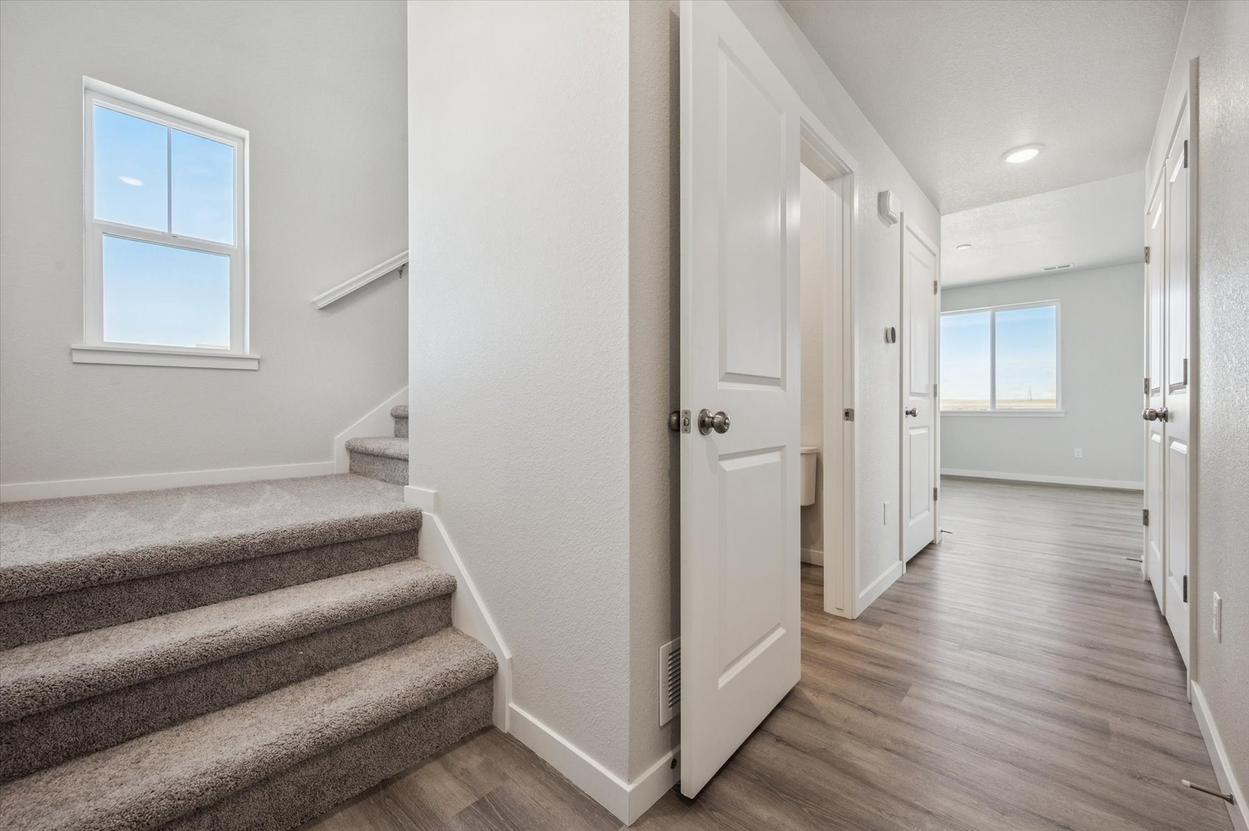 A room with white doors.