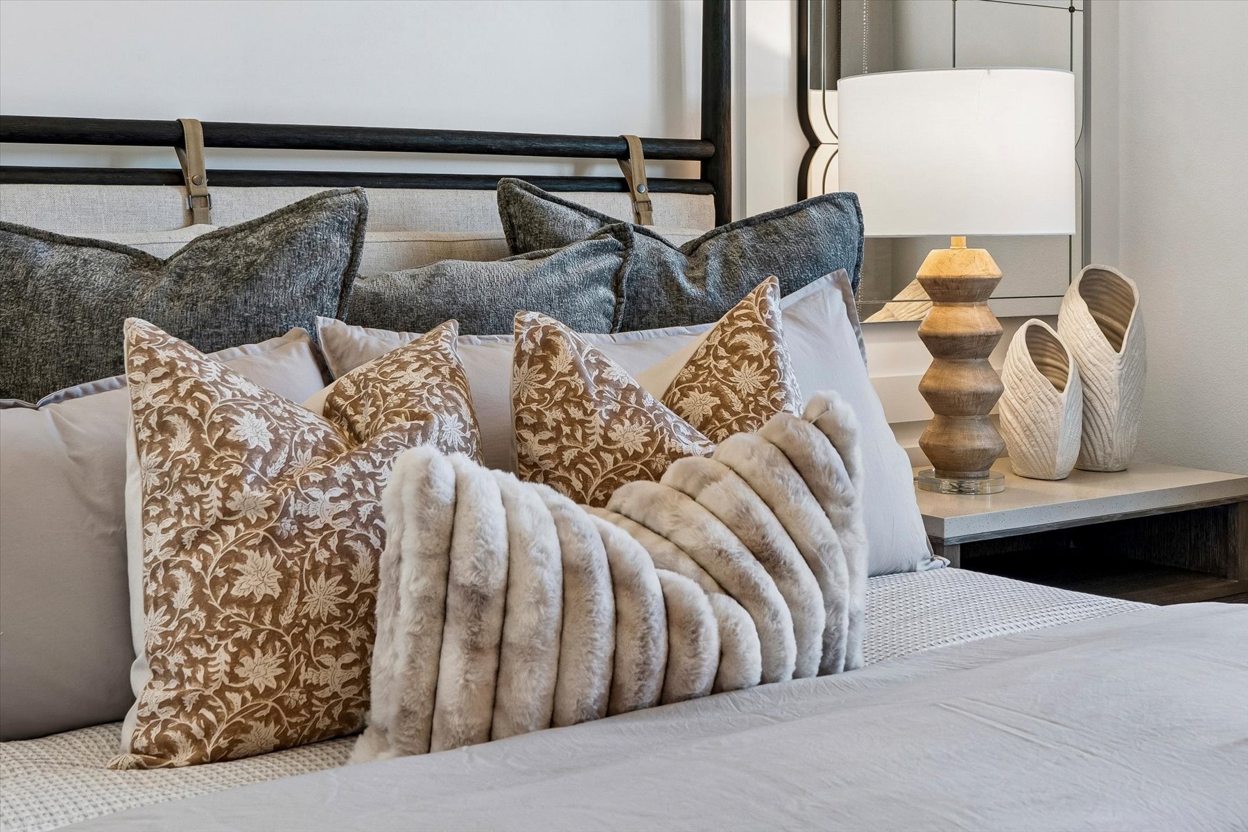 A couch with pillows.
