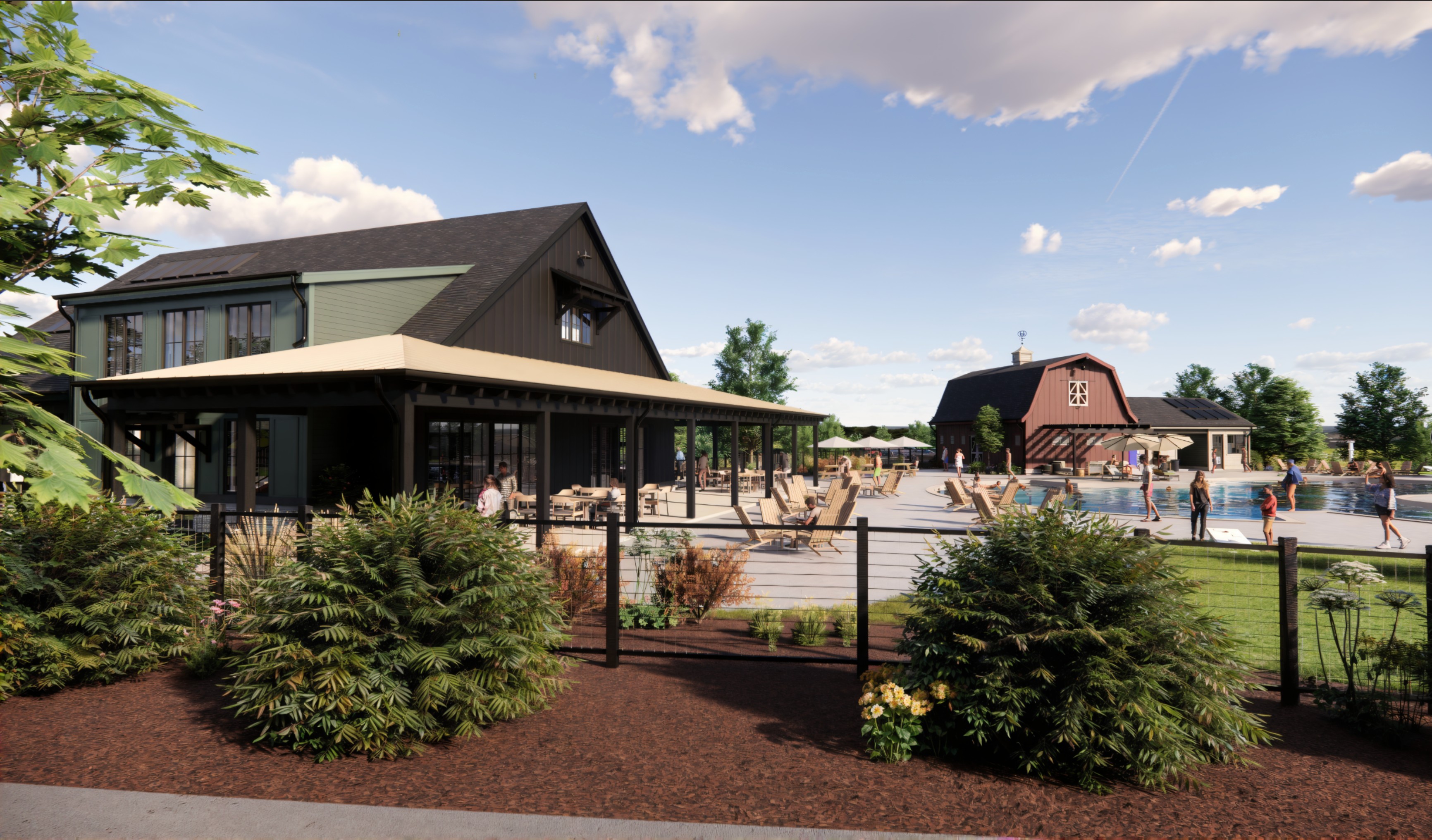 A building with a pool in front.