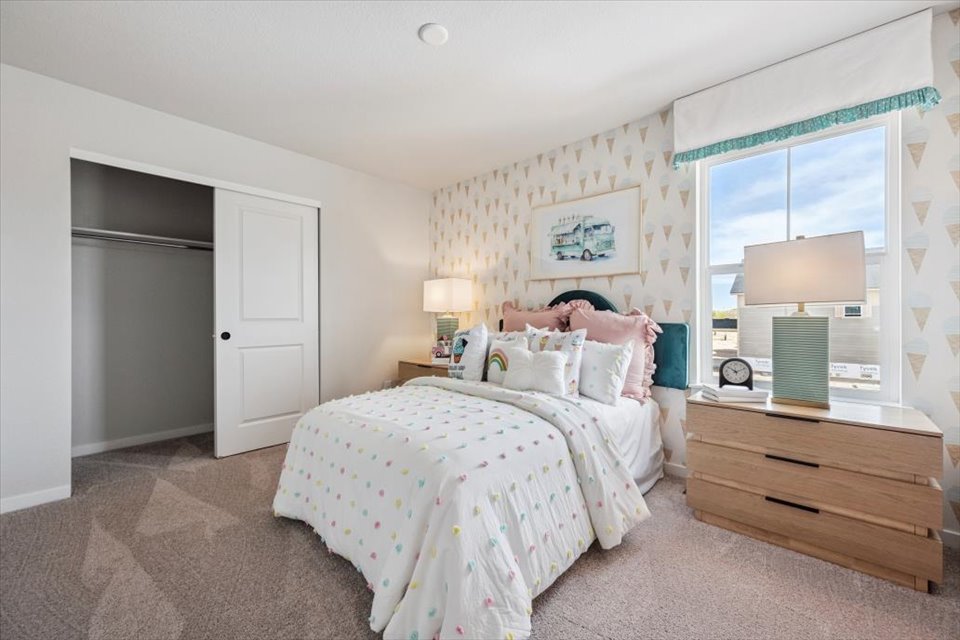 A person lying on a bed.