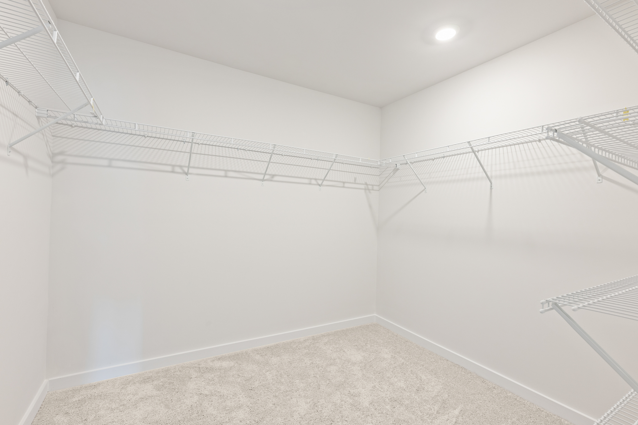 A white room with a white wall.