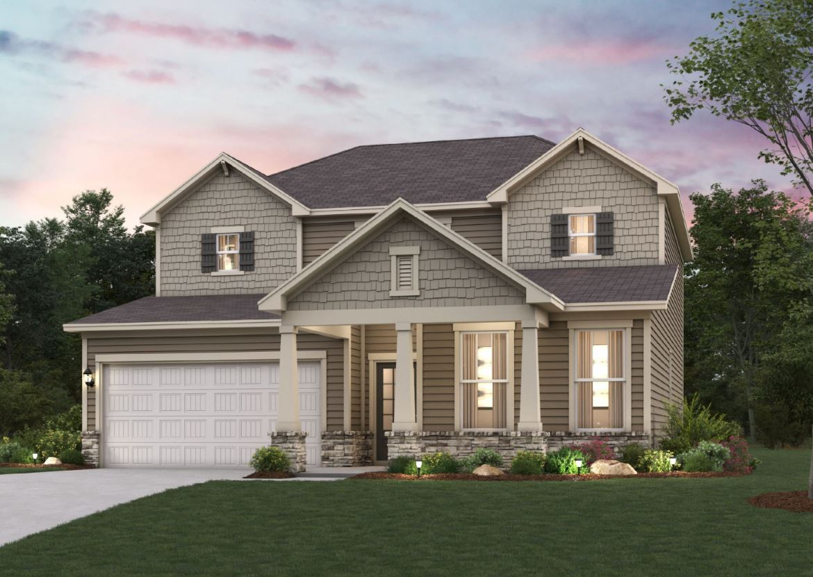 A house with a large front yard.