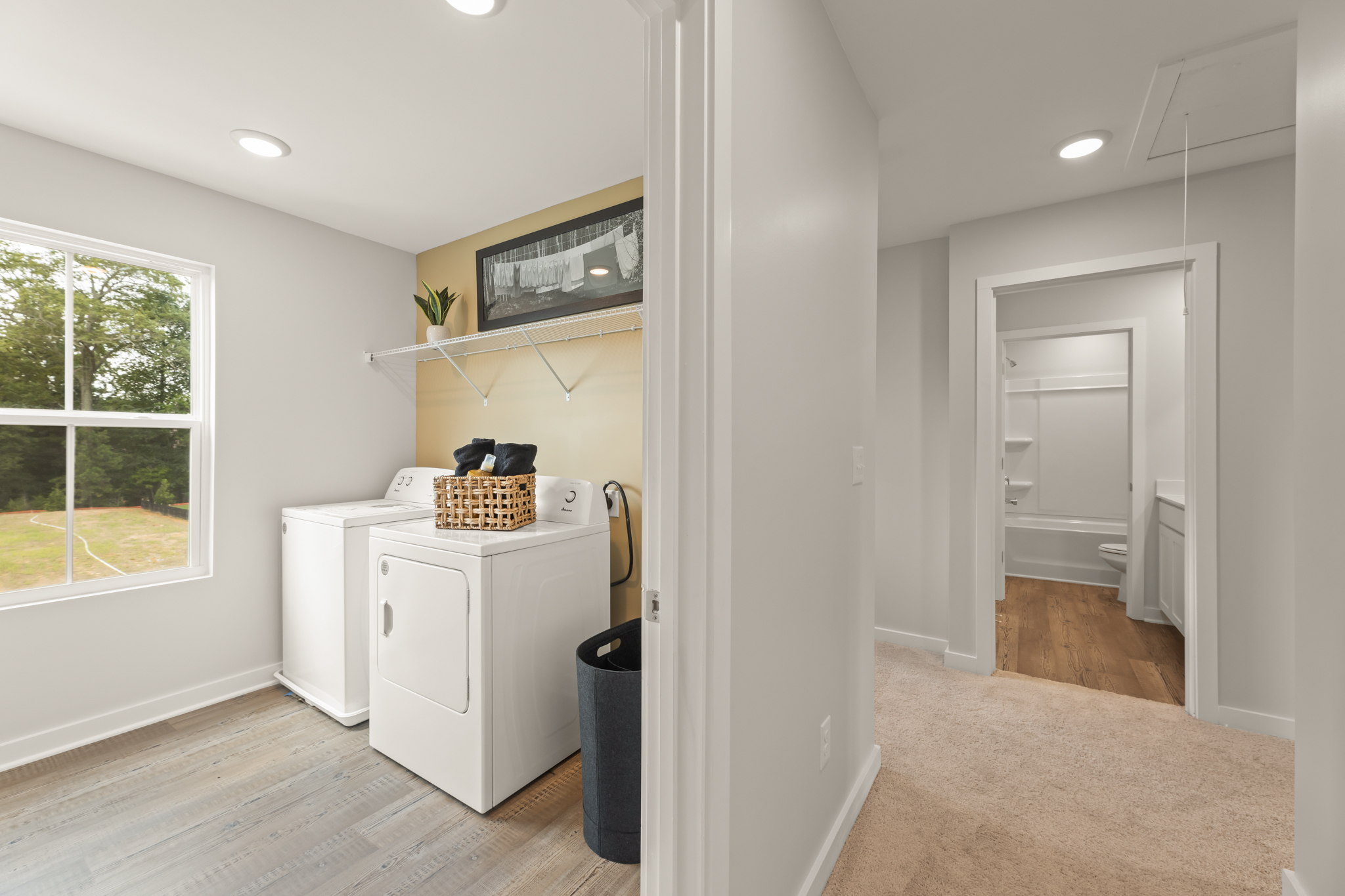 A room with a white cabinet and a white counter top.