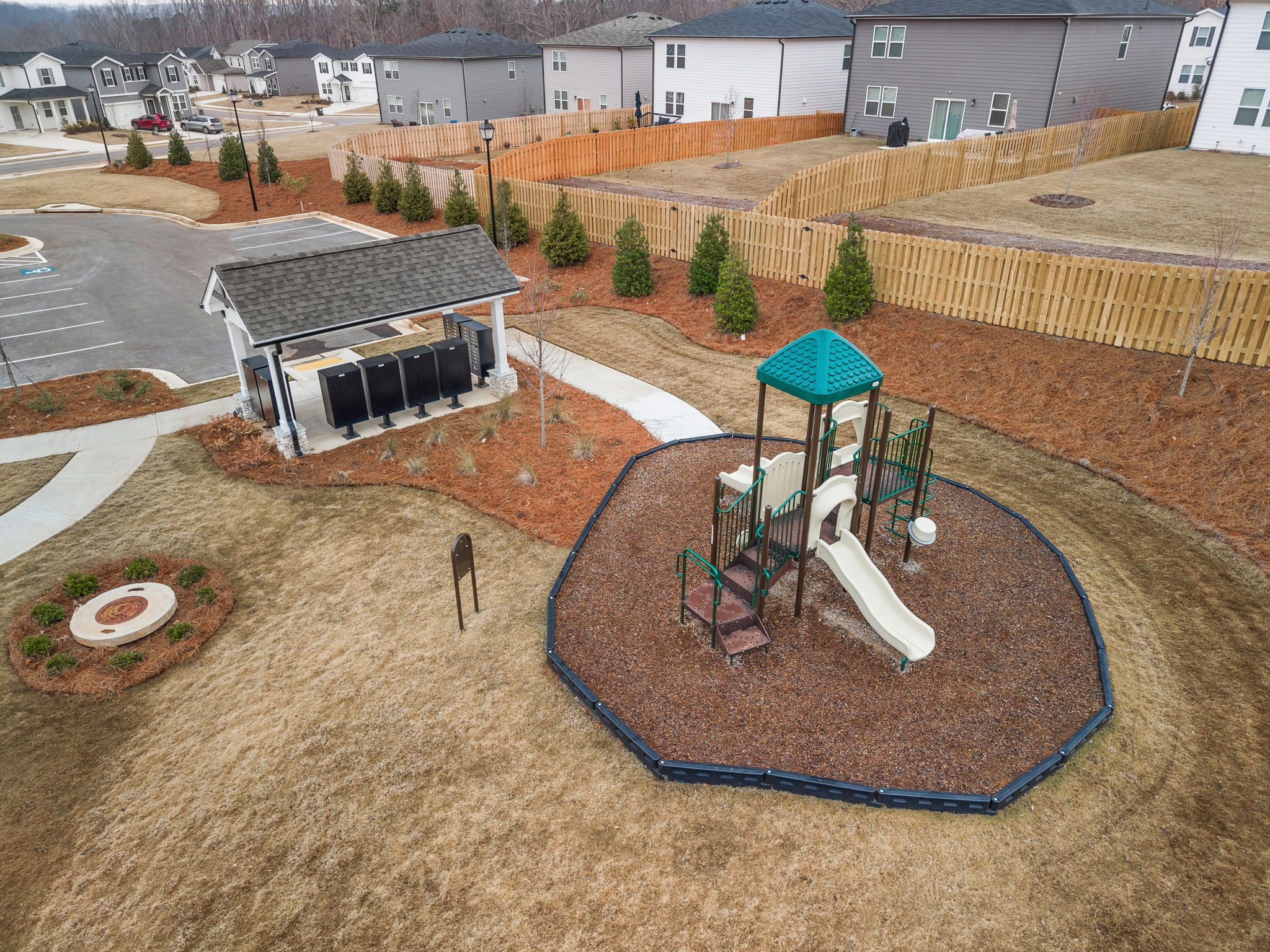 A miniature playground in a yard.