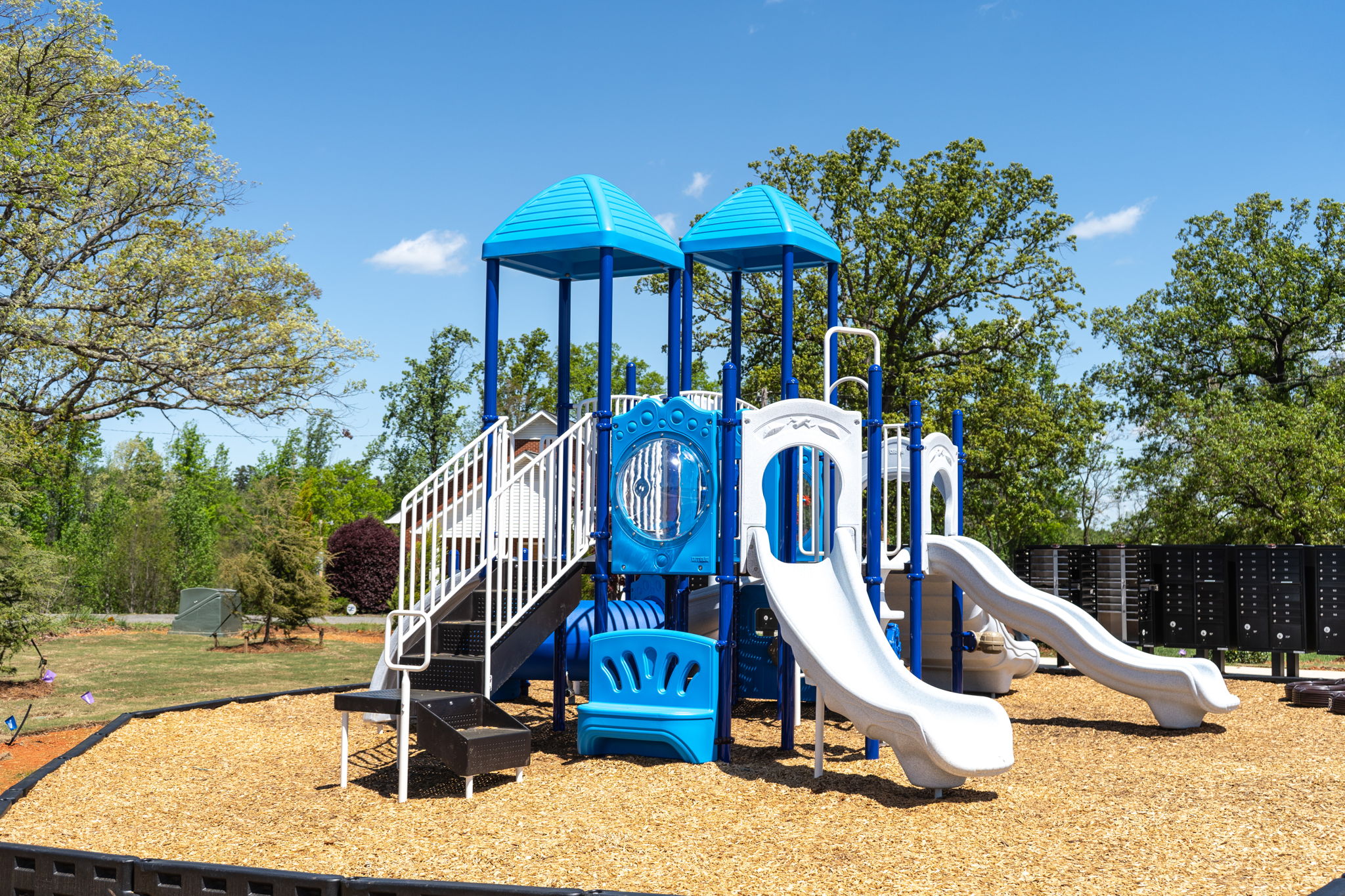 A playground with blue slide.