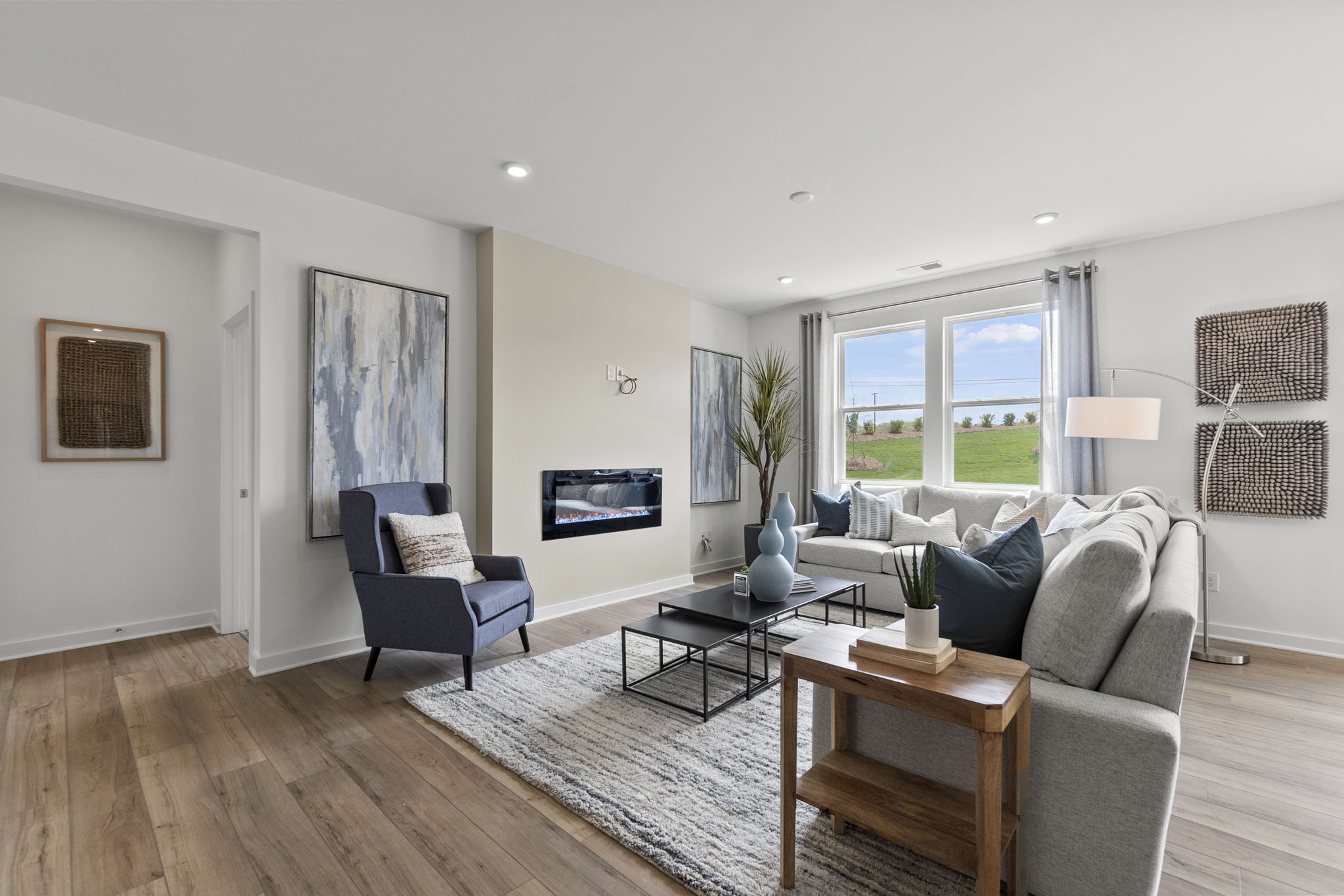 A living room with a couch and a coffee table.