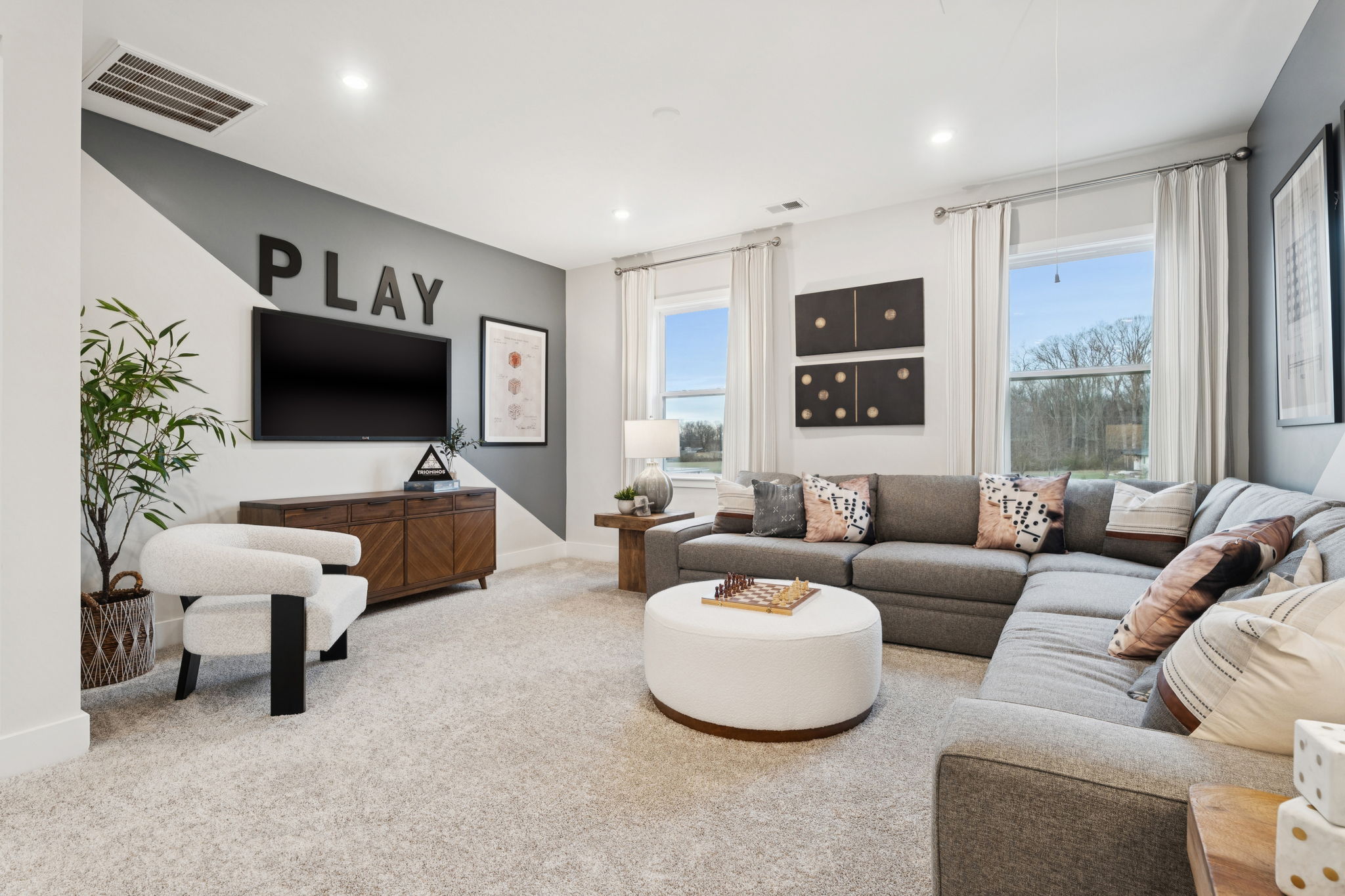 A living room with a fireplace.