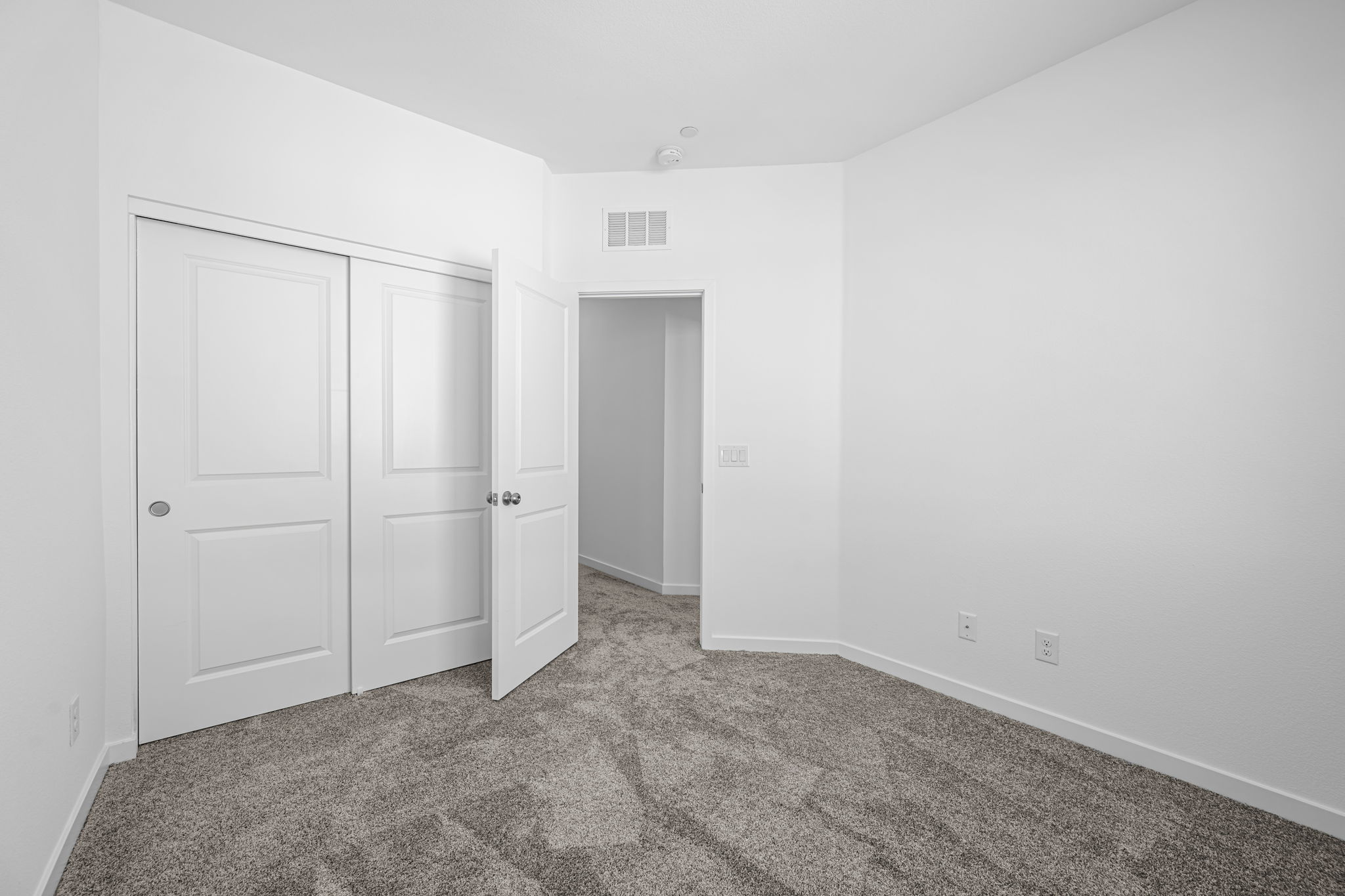 A room with white doors.