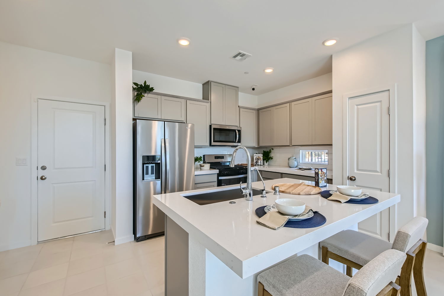 A kitchen with a large island.