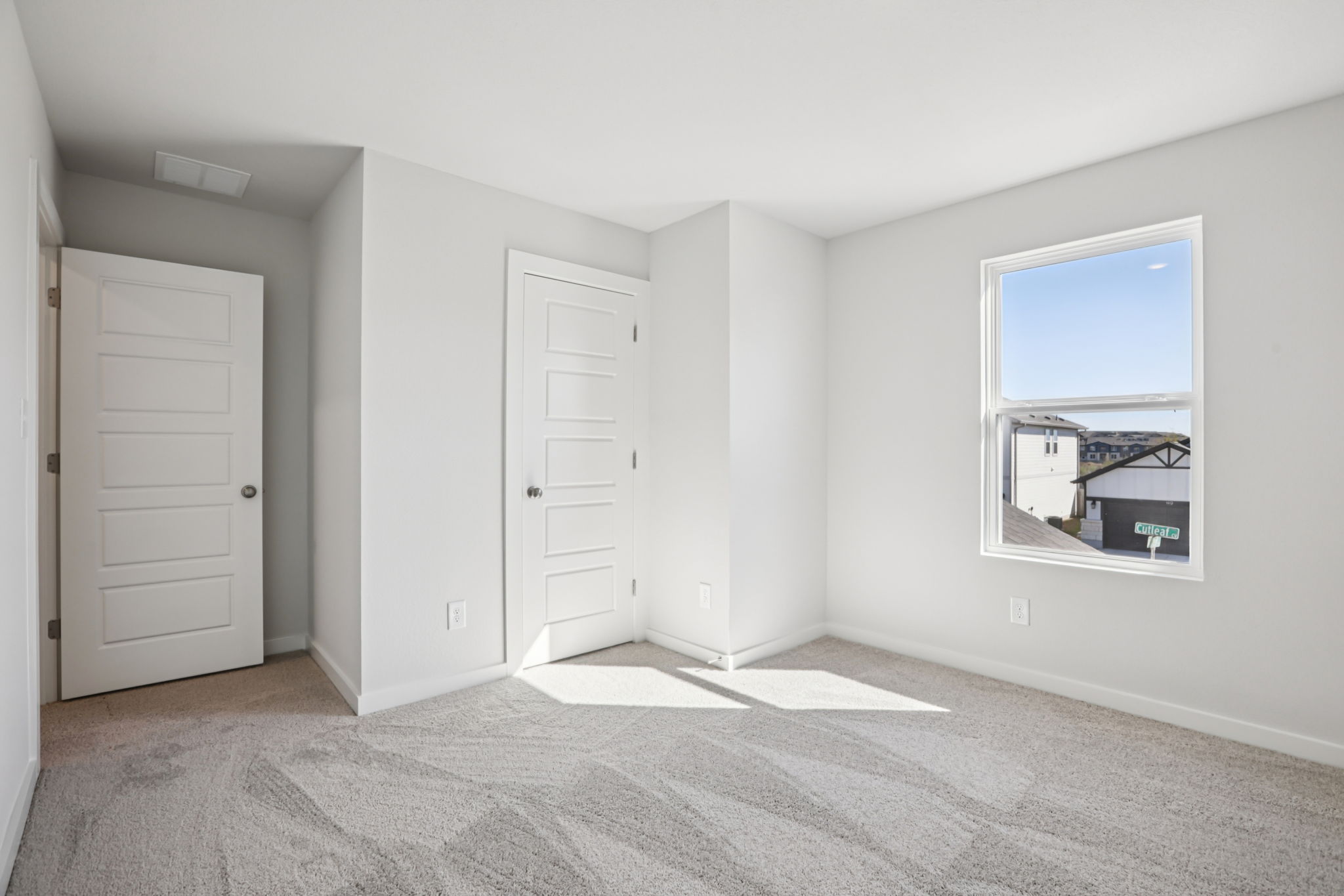 A room with white doors.