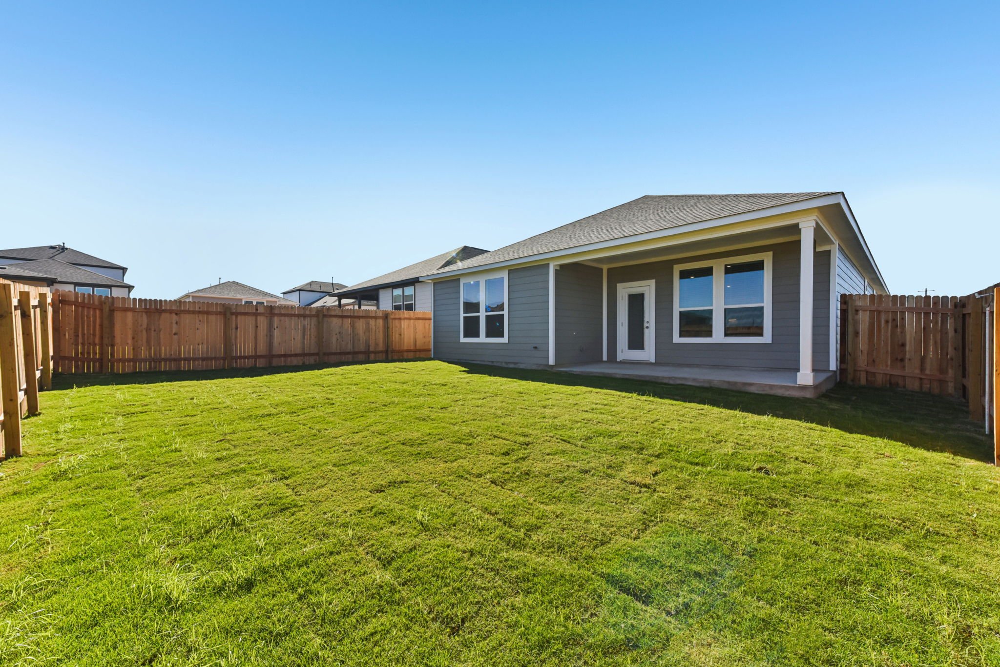 A house with a fence around it.