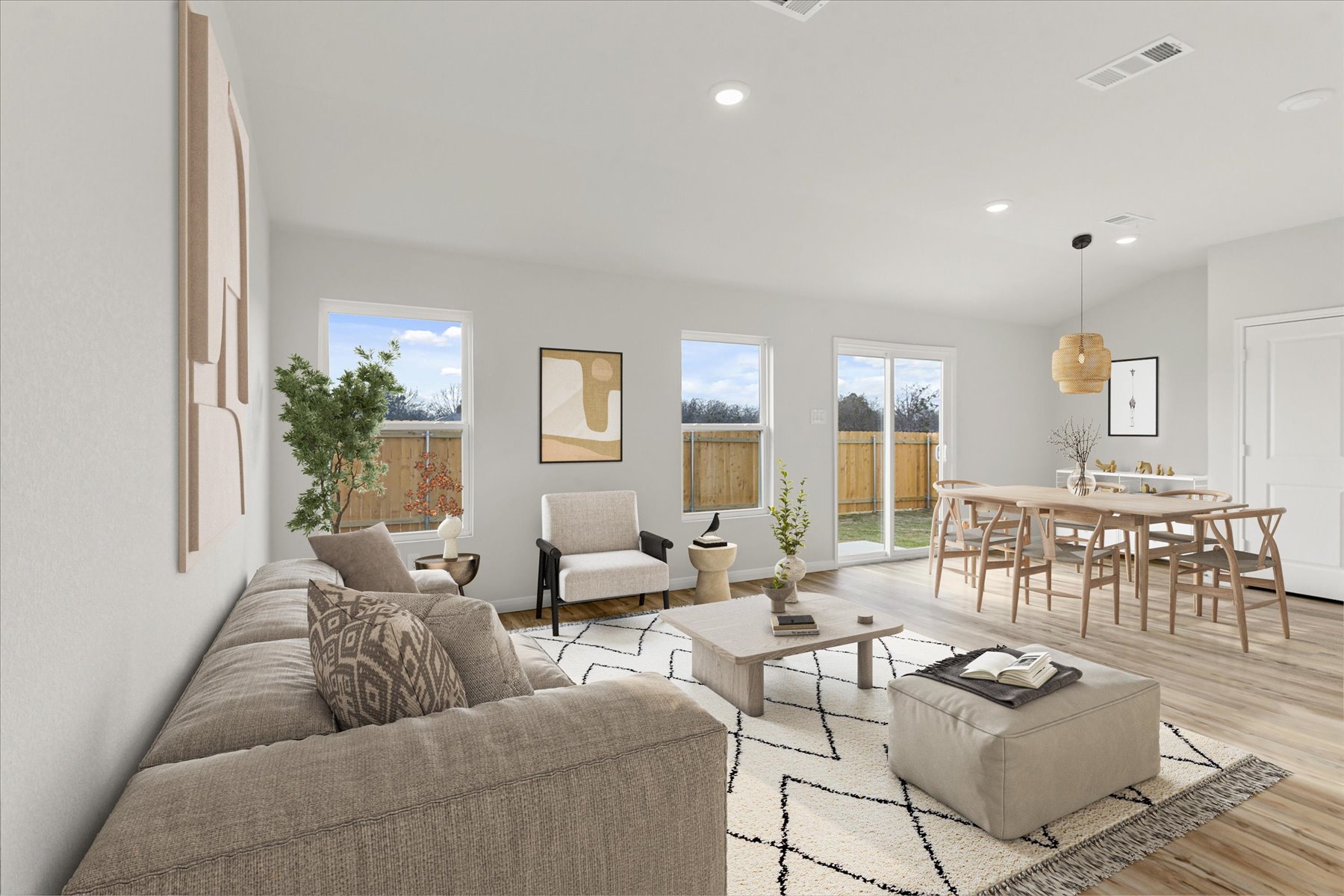 A living room with a couch and a table.