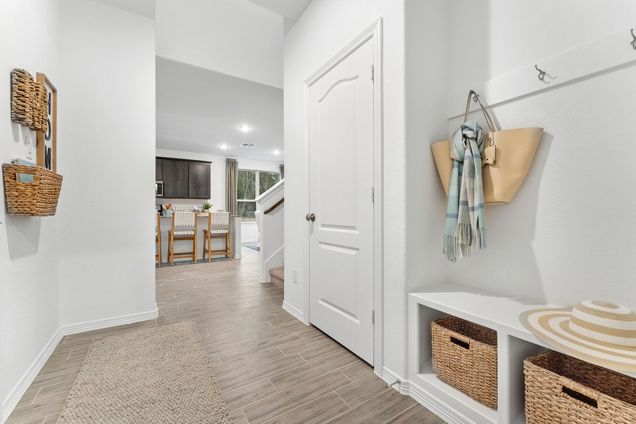 A room with a table and chairs.