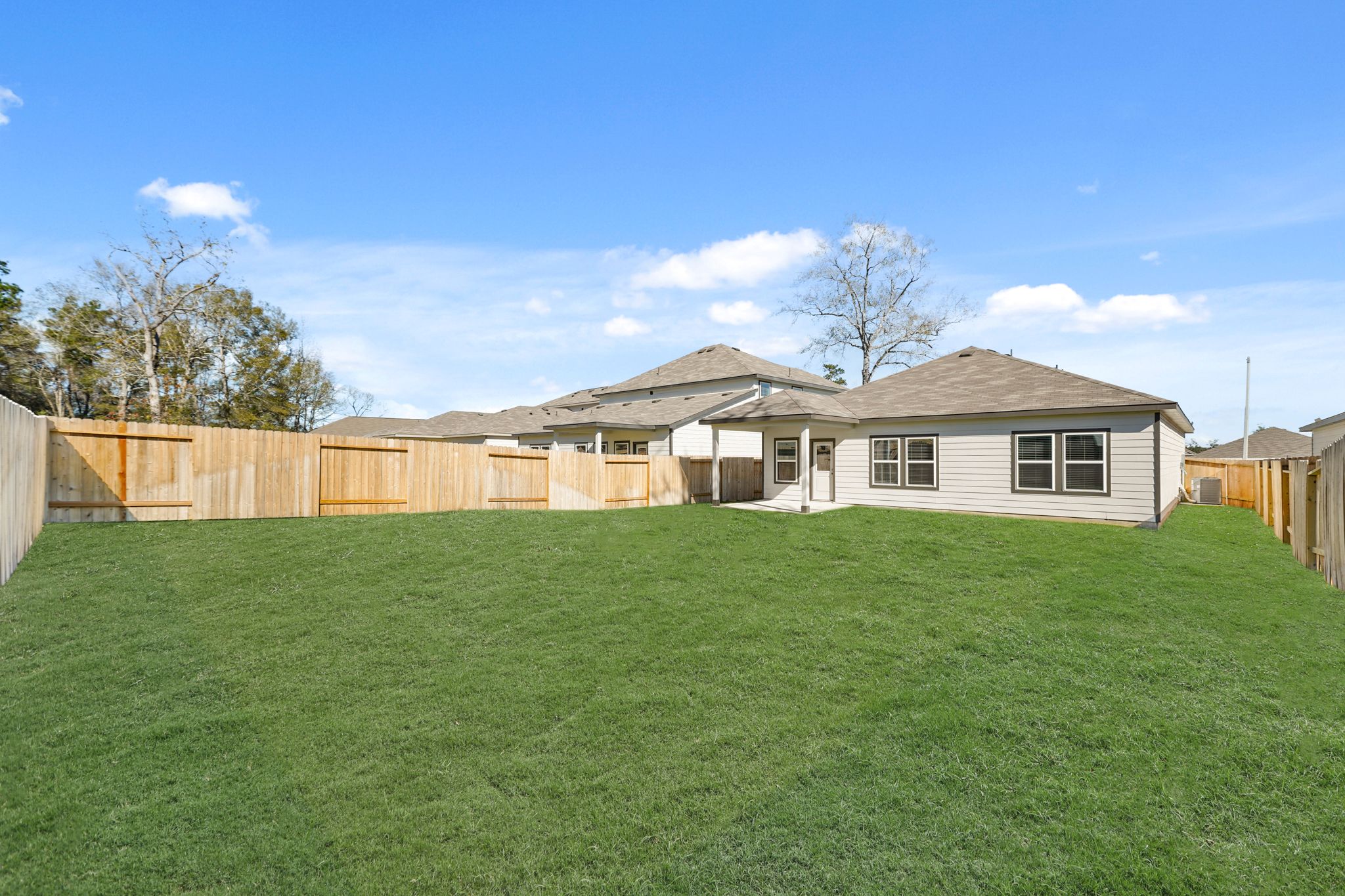 A house with a fence around it.