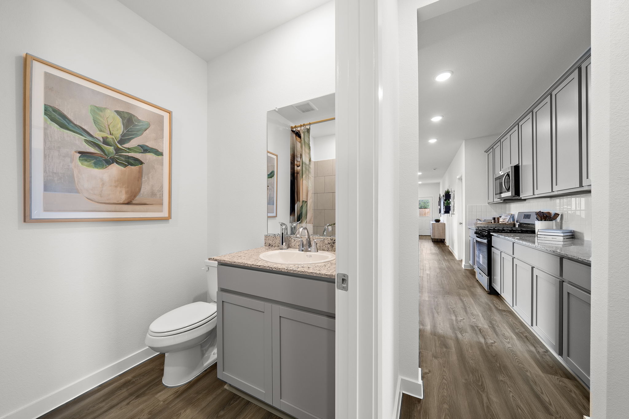 A bathroom with a toilet and sink.