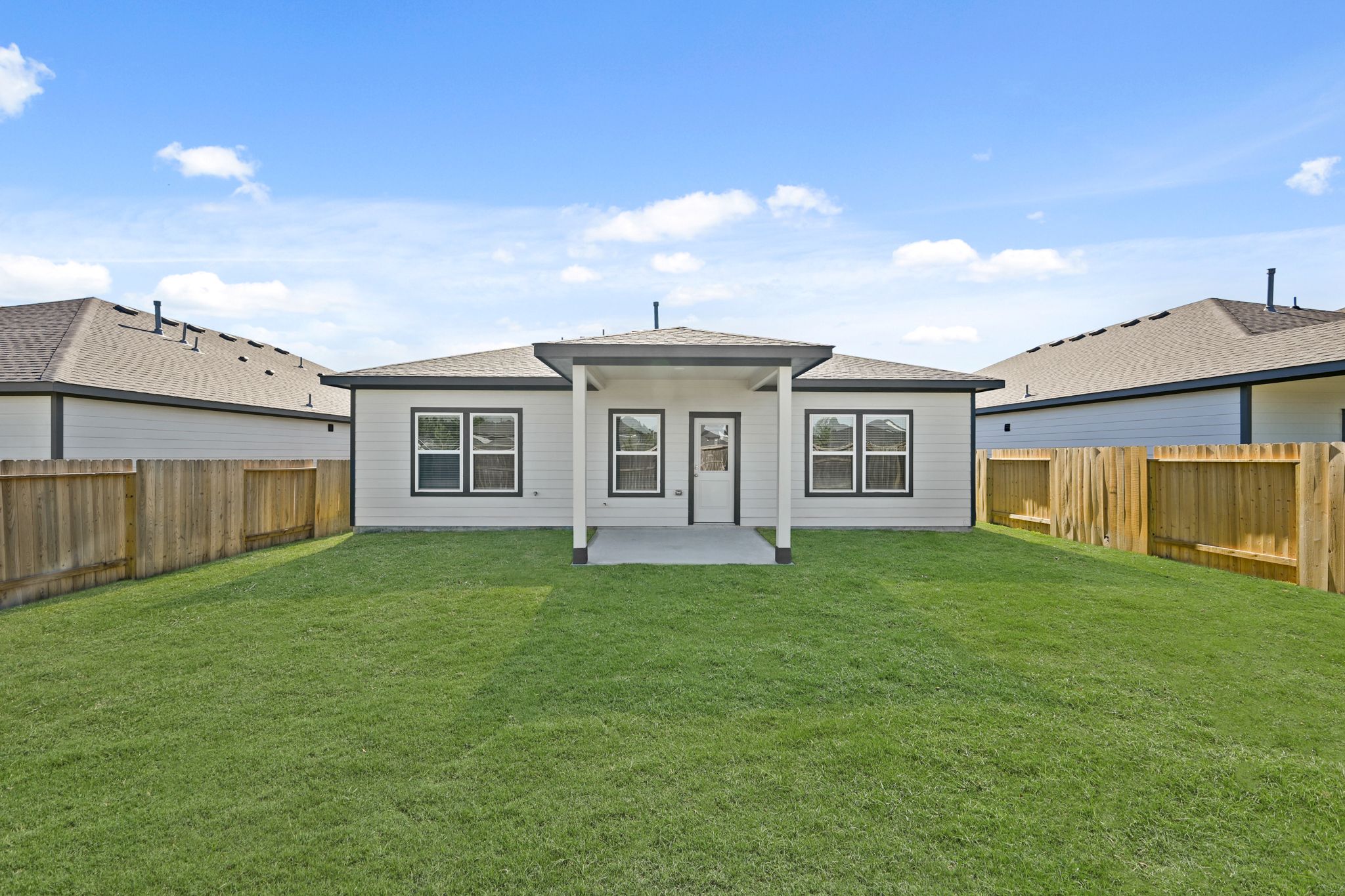 A house with a fence around it.