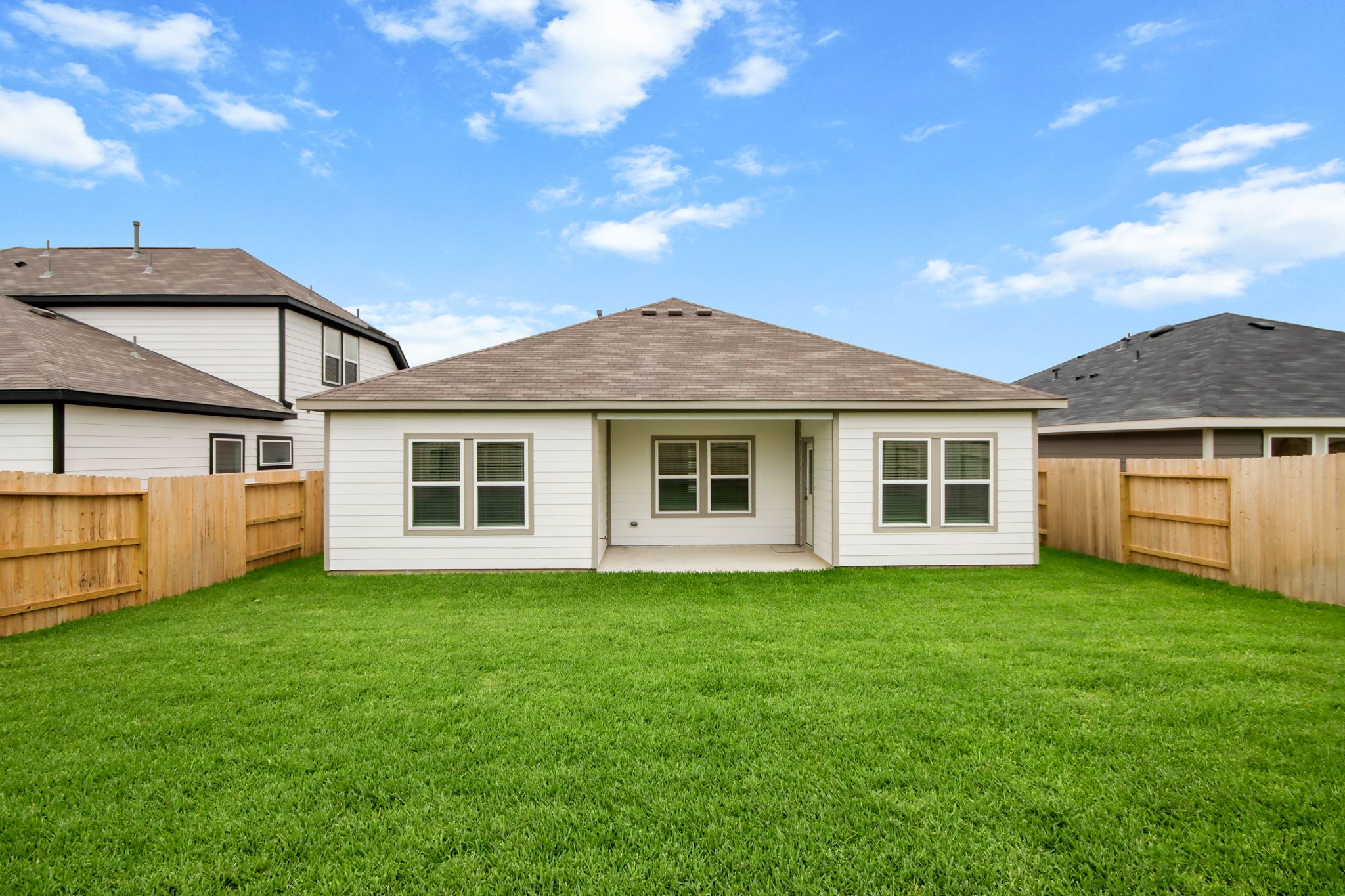 A house with a fence around it.