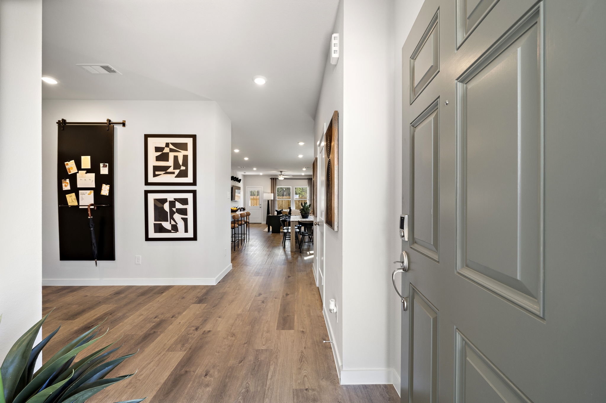 A hallway with white doors.