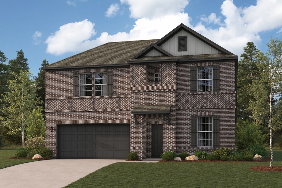 A brick house with a garage.