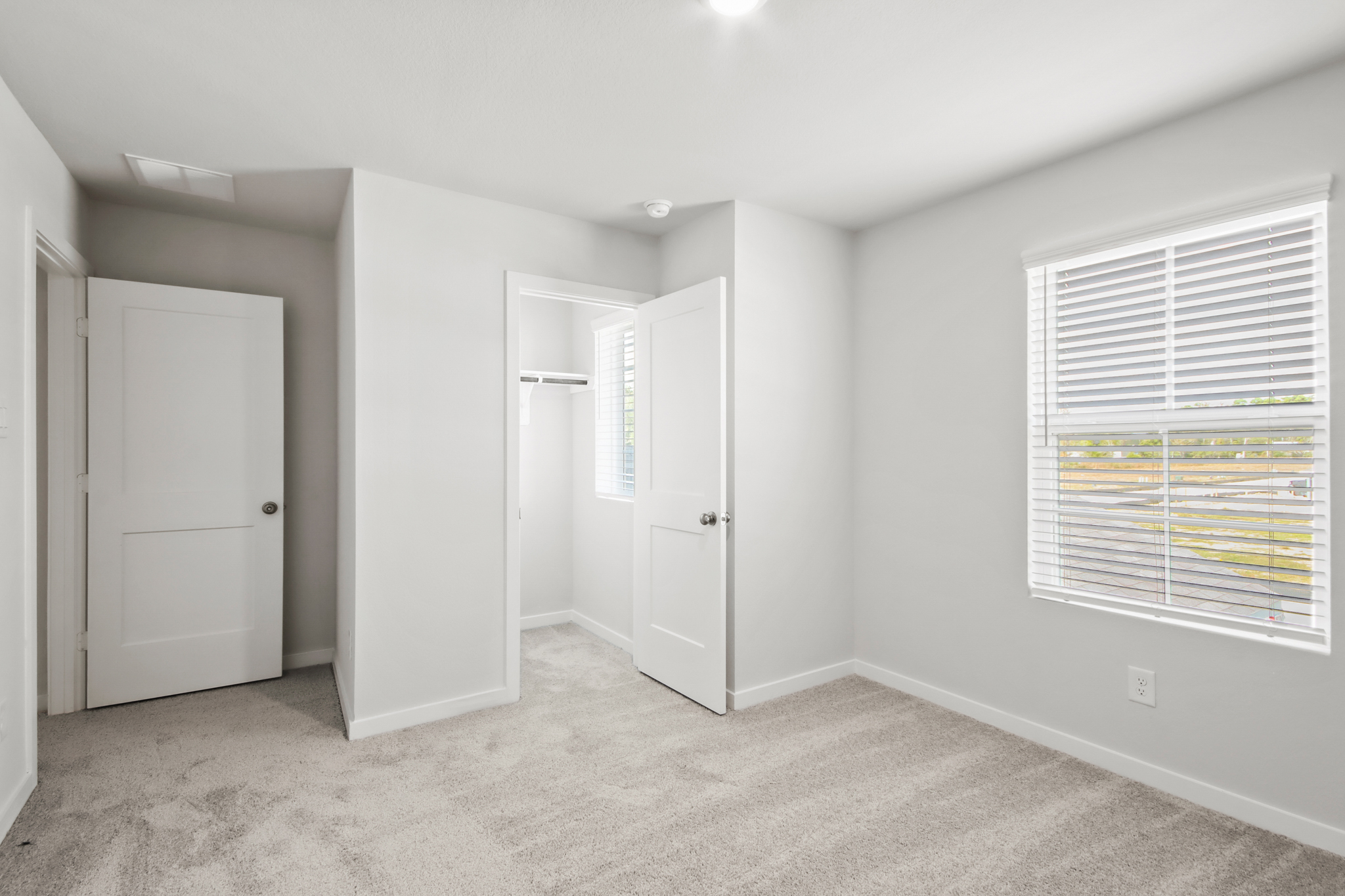 A room with white doors.