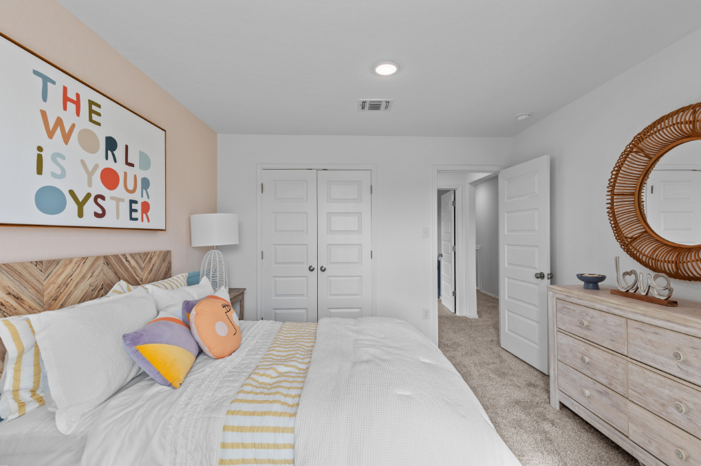 A bedroom with two beds.