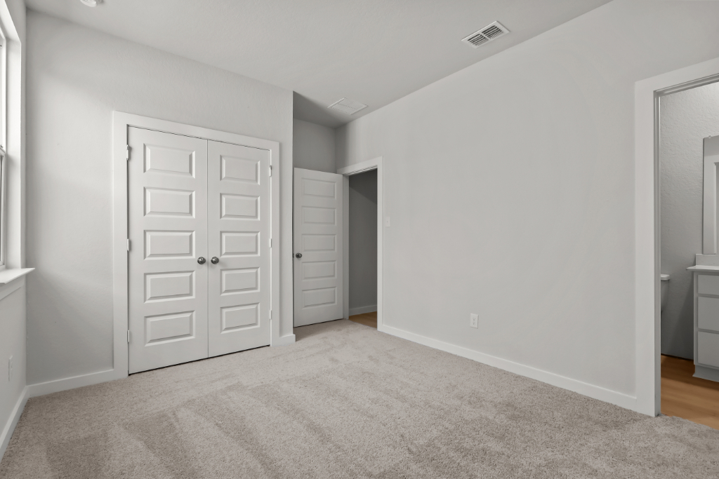 A room with white doors.
