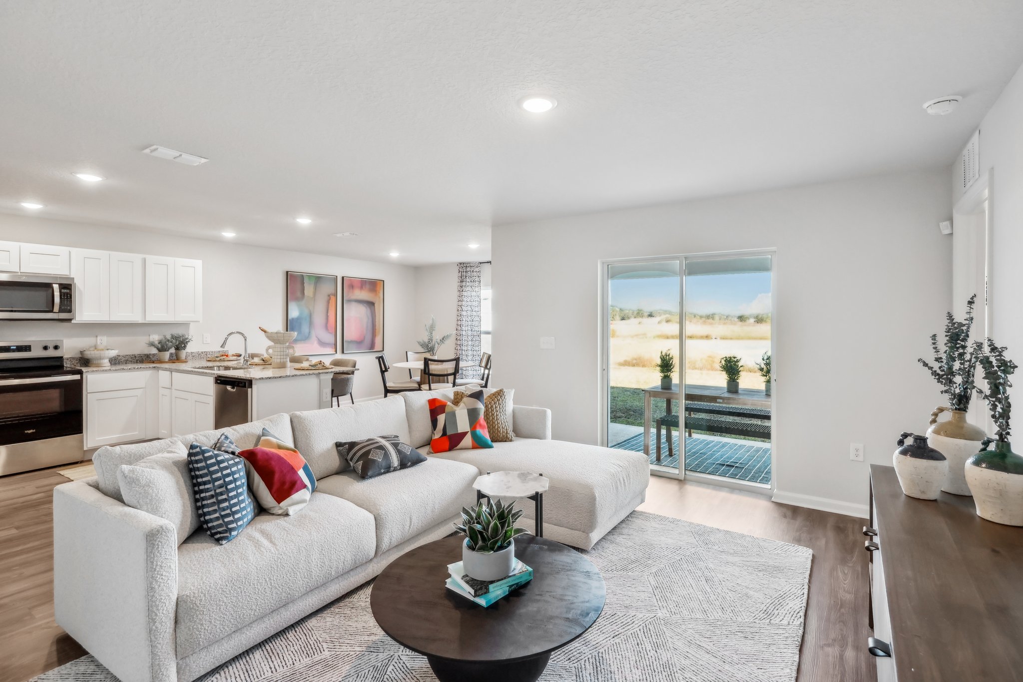 A living room with a large window.